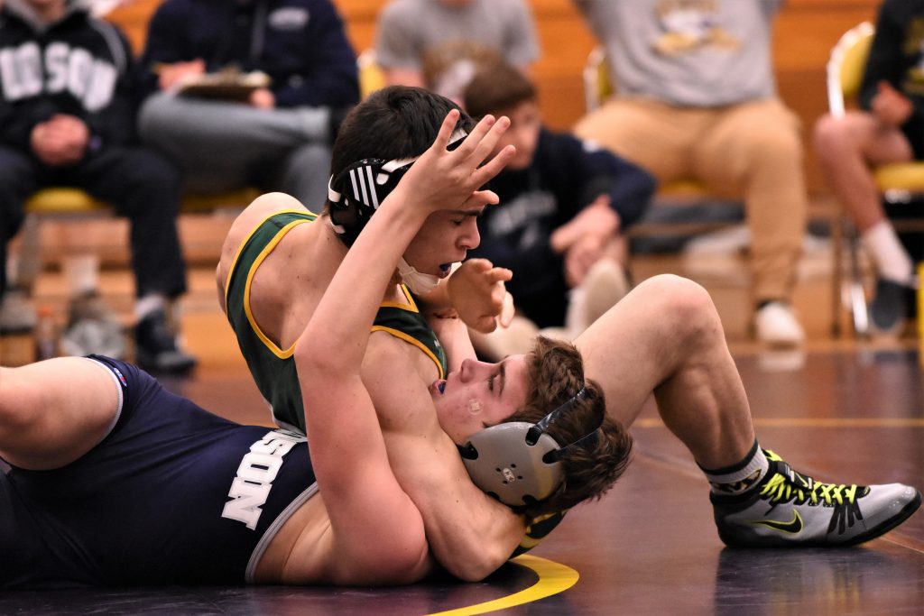 Intense wrestling match in progress