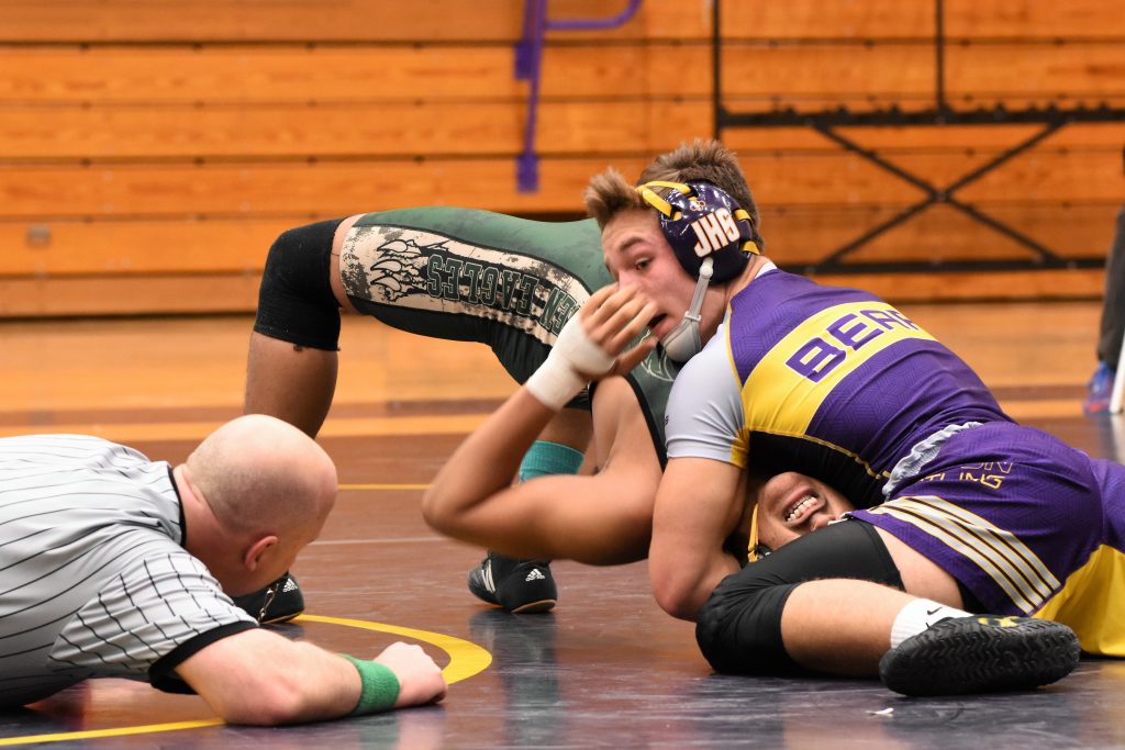 Intense wrestling match under way
