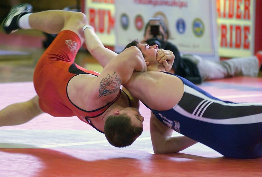 Athletes competing in wrestling bout